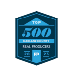 Recognized as a top producing team by Oakland County Real Producers