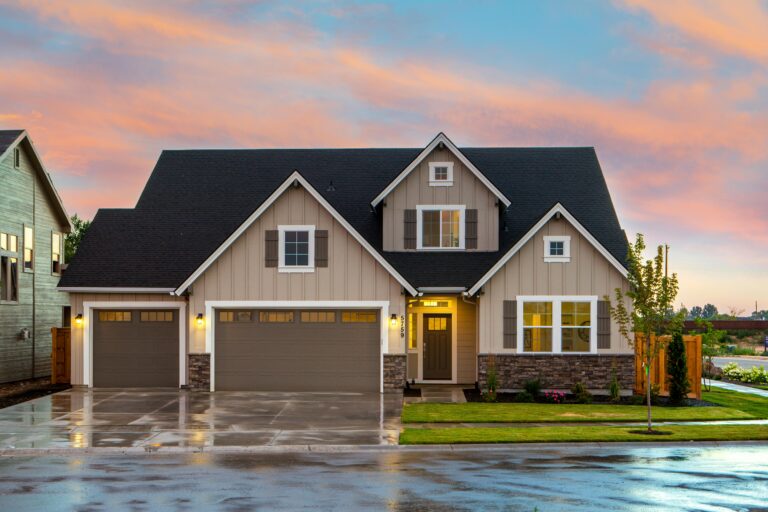 Brown and Gray painted house in front of road