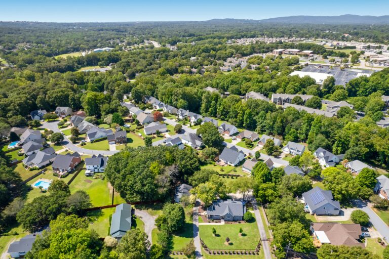 an aerial photo of houses in a neighborhood
