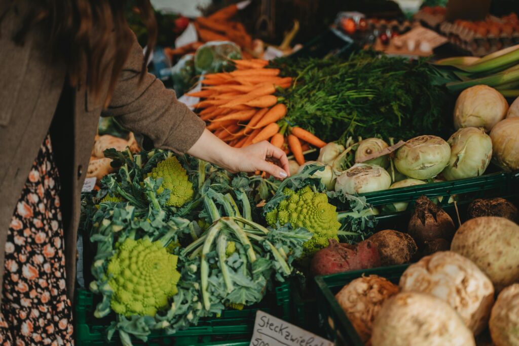 a person picking vegetables