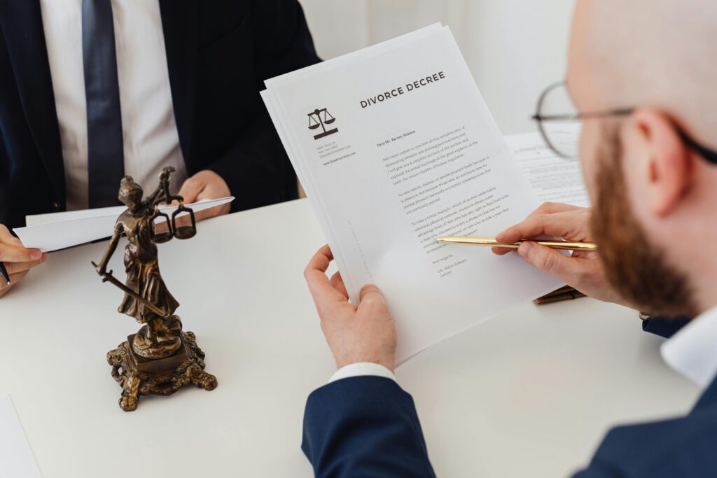a person holding divorce decree documents